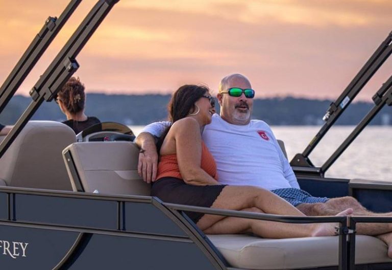 Godfrey pontoon couple relaxing 768x528
